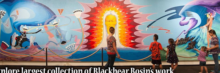 colorful mural "Explore largest collection of Blackbear Bosin's work"