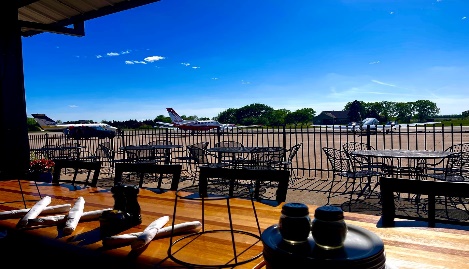 outdoor seating area with very blue sky